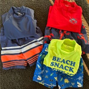 Three boys bathing suit sets